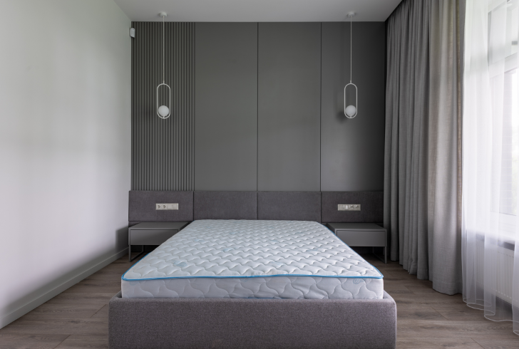 Mattress with tufting buttons visible
