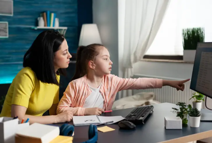 Parent explaining budgeting to child