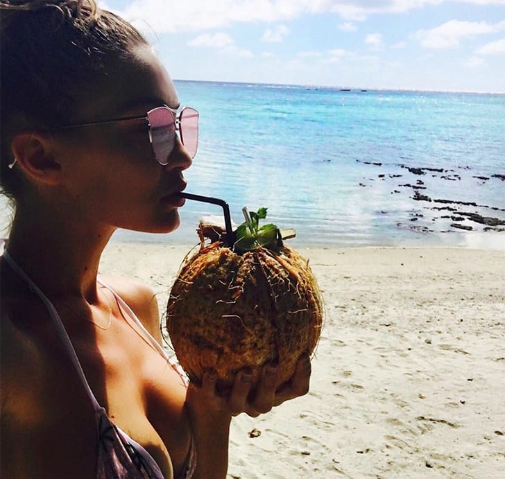 Gigi Hadid – Savoring Summer’s Sweetness Beachside